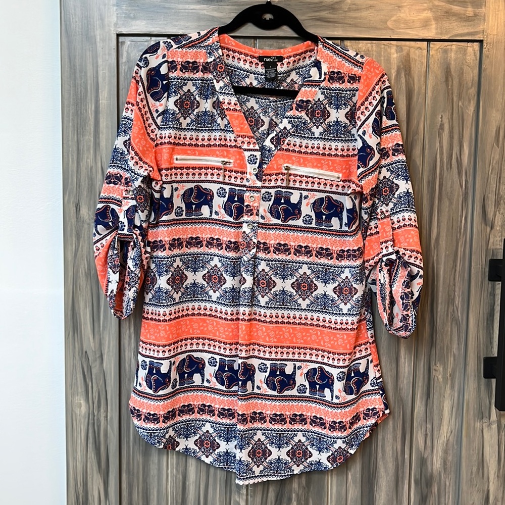 Ladies Rue 21 V Neck blouse size Large. With 2 fake zipper front pockets.